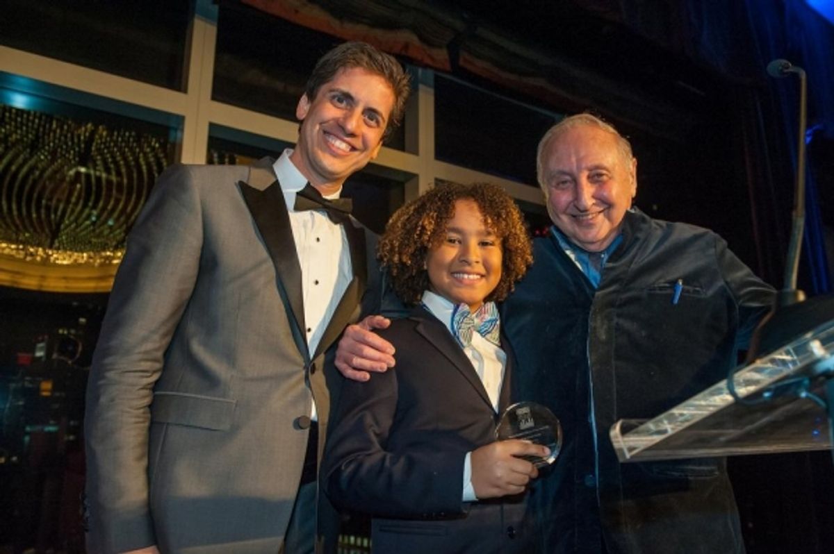 Presenting the YPC's Artistic Award to Seymour Bernstein (right) are Francisco Nunez and YPC chorister Tenzin
 at 