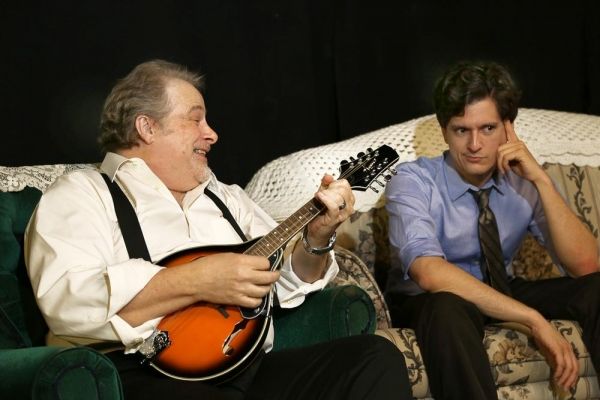 Frank (Scott Holmes) Entertains his grandson Nick (Louis Crespo) with his newly acqui Photo