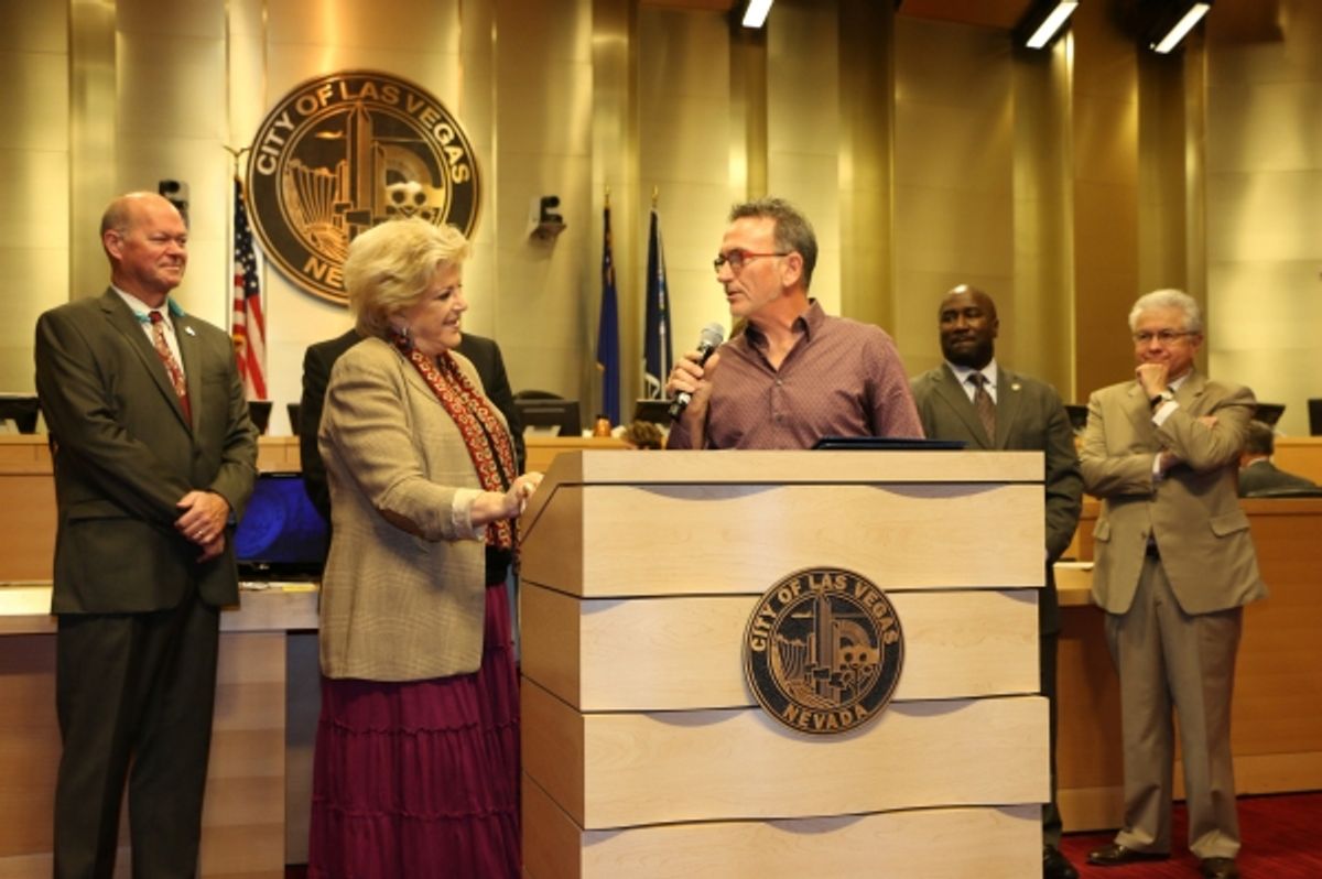 Restaurateur and advocate for sustainable seafood Chef Rick Moonen receives a City of Las Vegas proclamation from Mayor Carolyn Goodman at 