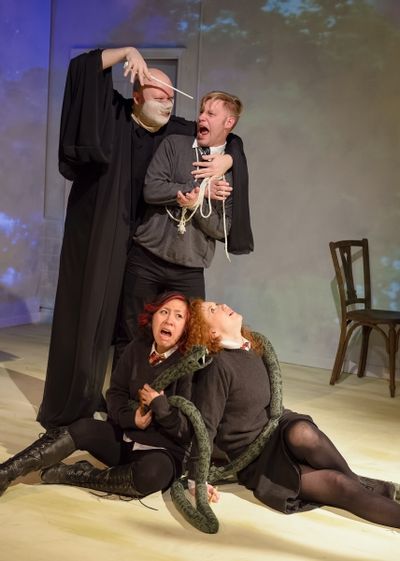 Within the HARRY POTTER badfic, Lord Voldemort holds Draco hostage (standing l to r - Photo