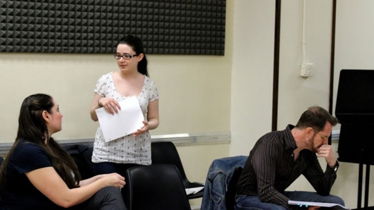 Kelly Reader (Amanda) rehearses with cast members of NEAT & TIDY at 