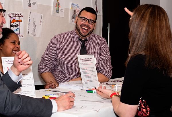 Steppenwolf staff members Yolanda Davis and Jared Bellot guided attendees in an artis Photo