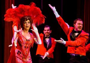 Andrea McArdle as Dolly, with waiters Zachary Chiero and JP Dunphy Photo