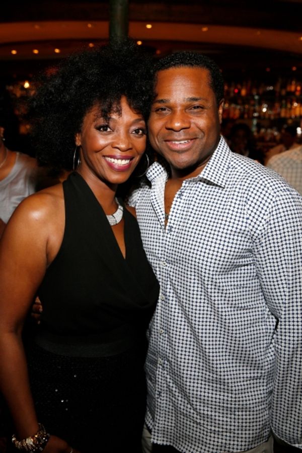 Cast member Shanesia Davis and actor Malcolm-Jamal Warner Photo