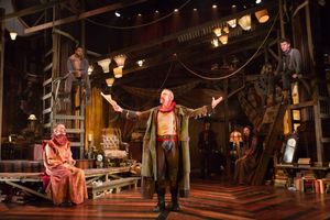 The Player (Ian Merrill Peakes) commands the stage in Rosencrantz and Guildenstern Are Dead. Also pictured, left to right: Stephen Russell Murray, Romell Witherspoon, Jacob Yeh, Rachel Zampelli, Adam Wesley Brown. @ BroadwayWorld The Player (Ian Merrill Peakes) commands the stage in Rosencrantz and Guildenstern Ar Photo