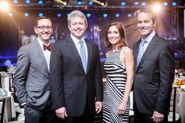 Steppenwolf Managing Director David Schmitz with 2015 Gala co-chairs Scott Swanson, E Photo