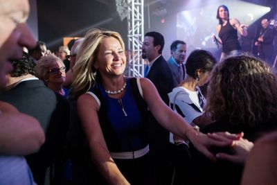 Mary Riccioni dances to Gary Sinise and the Lt. Dan Band Photo