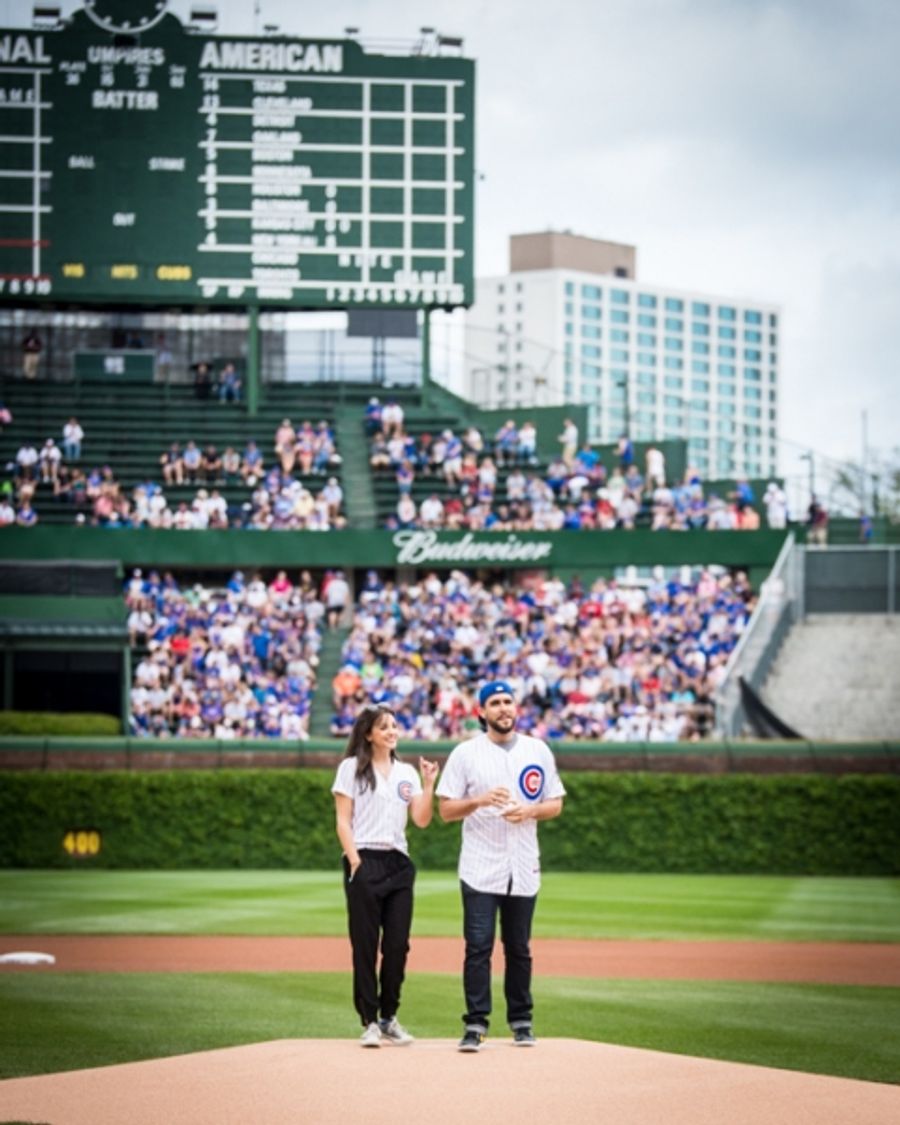 Exclusive Photo Coverage: ON YOUR FEET Stars Ana Villafañe and Josh Segarra Throw Out First Pitch at Chicago Cubs Game Image