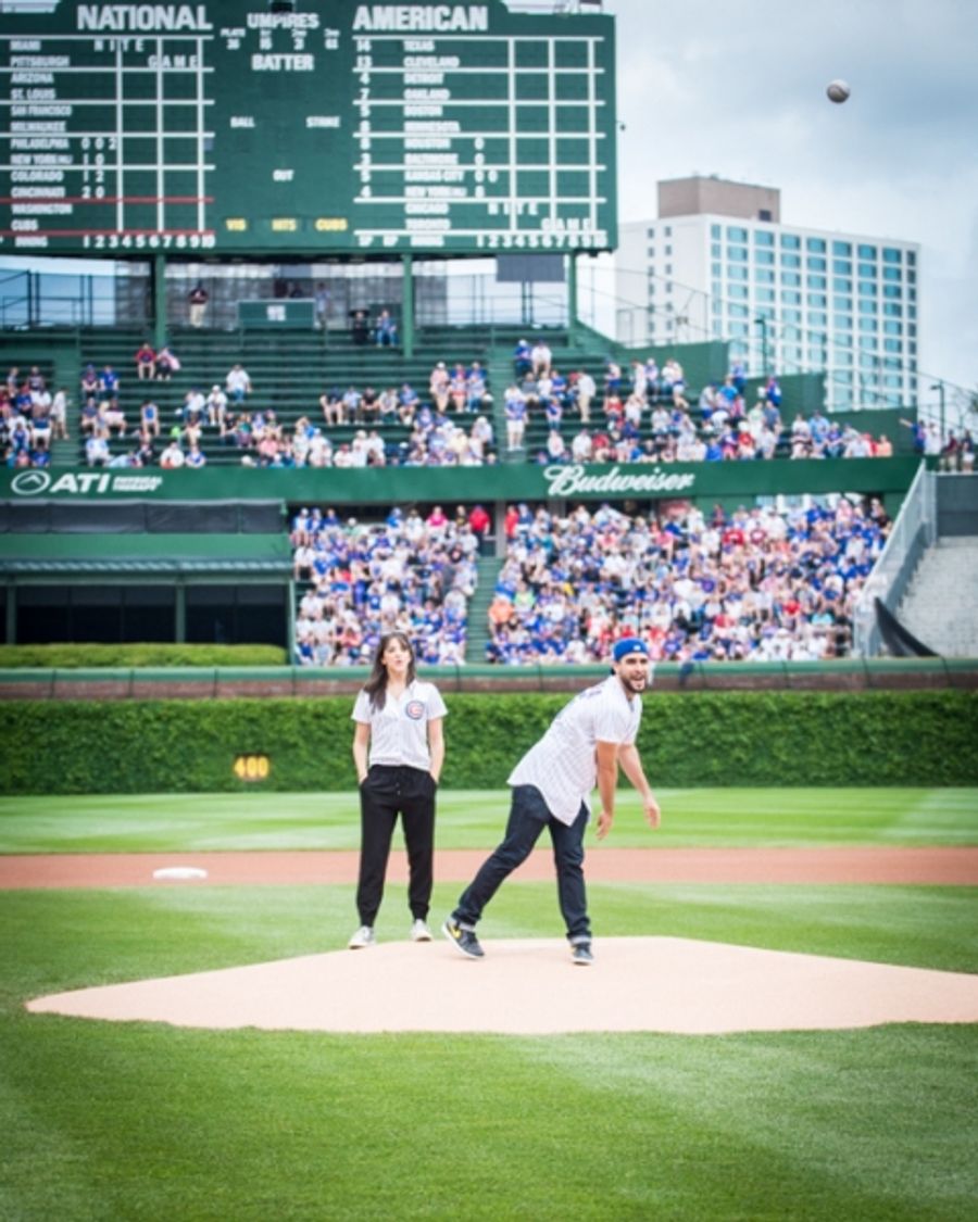 Exclusive Photo Coverage: ON YOUR FEET Stars Ana Villafañe and Josh Segarra Throw Out First Pitch at Chicago Cubs Game Image