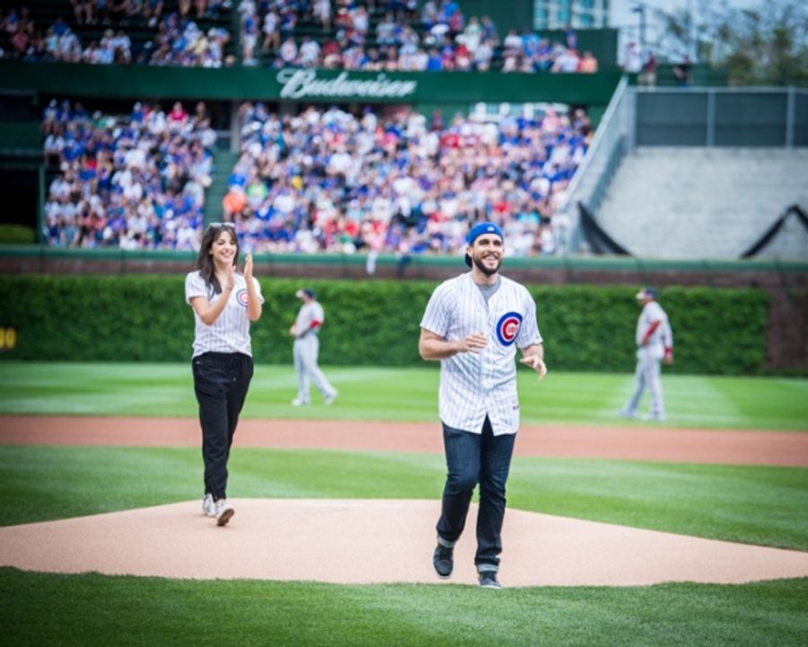 Exclusive Photo Coverage: ON YOUR FEET Stars Ana Villafañe and Josh Segarra Throw Out First Pitch at Chicago Cubs Game Image