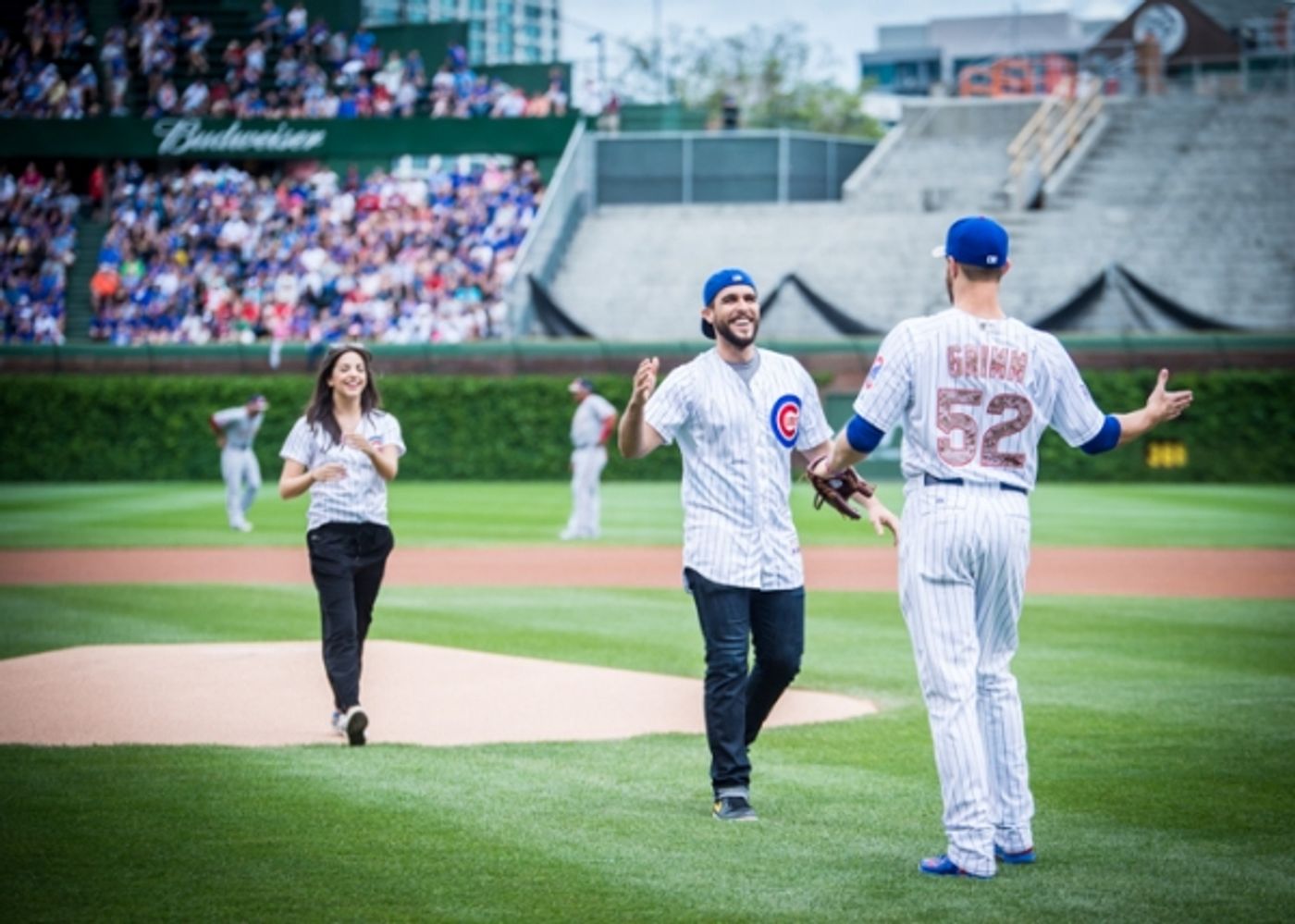 Exclusive Photo Coverage: ON YOUR FEET Stars Ana Villafañe and Josh Segarra Throw Out First Pitch at Chicago Cubs Game  Image