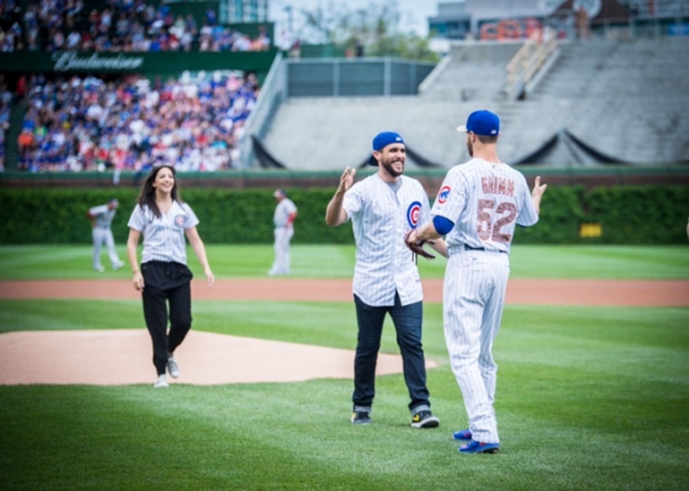 Exclusive Photo Coverage: ON YOUR FEET Stars Ana Villafañe and Josh Segarra Throw Out First Pitch at Chicago Cubs Game  Image