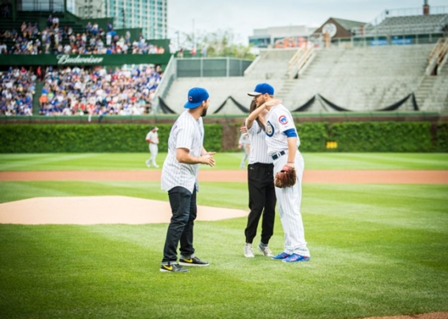 Exclusive Photo Coverage: ON YOUR FEET Stars Ana Villafañe and Josh Segarra Throw Out First Pitch at Chicago Cubs Game Image