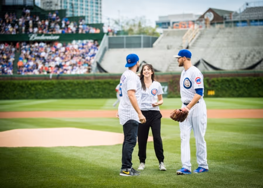 Exclusive Photo Coverage: ON YOUR FEET Stars Ana Villafañe and Josh Segarra Throw Out First Pitch at Chicago Cubs Game Image