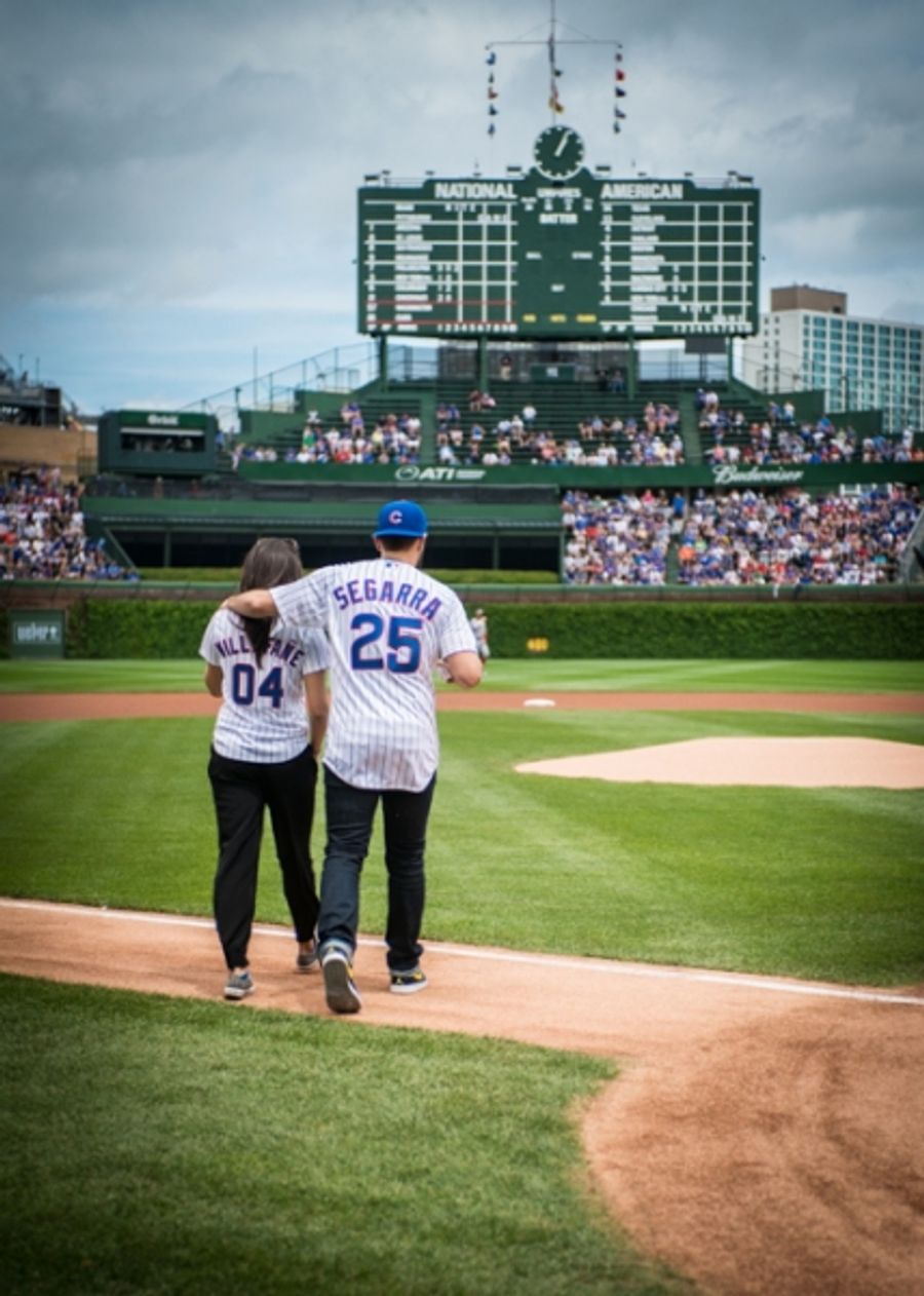 Exclusive Photo Coverage: ON YOUR FEET Stars Ana Villafañe and Josh Segarra Throw Out First Pitch at Chicago Cubs Game Image