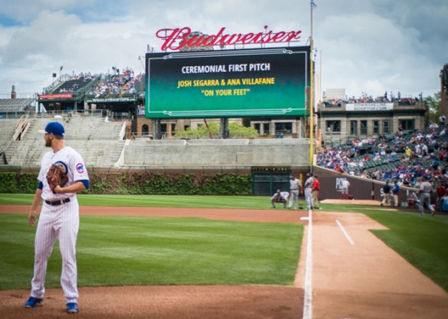 Exclusive Photo Coverage: ON YOUR FEET Stars Ana Villafañe and Josh Segarra Throw Out First Pitch at Chicago Cubs Game Image