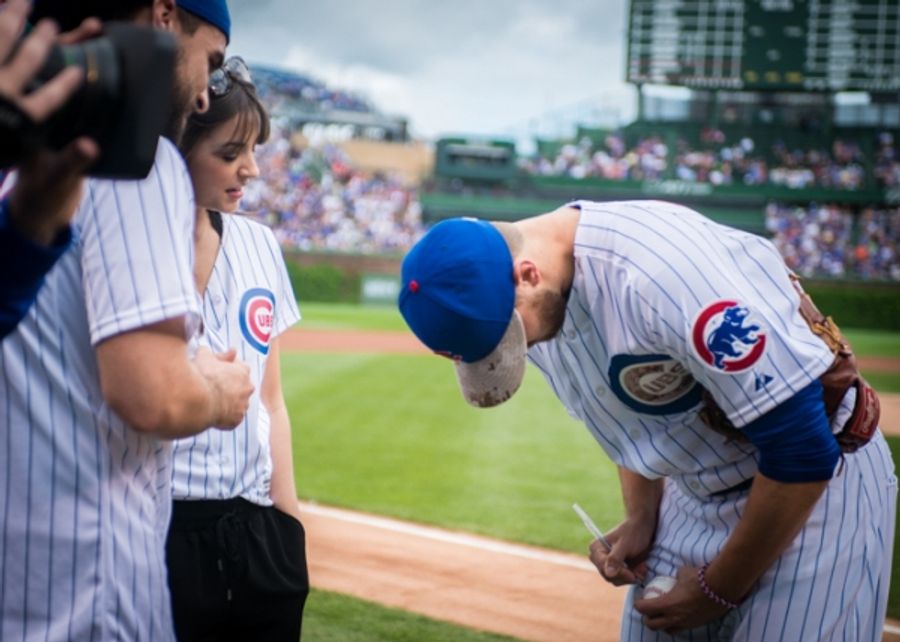 Exclusive Photo Coverage: ON YOUR FEET Stars Ana Villafañe and Josh Segarra Throw Out First Pitch at Chicago Cubs Game Image