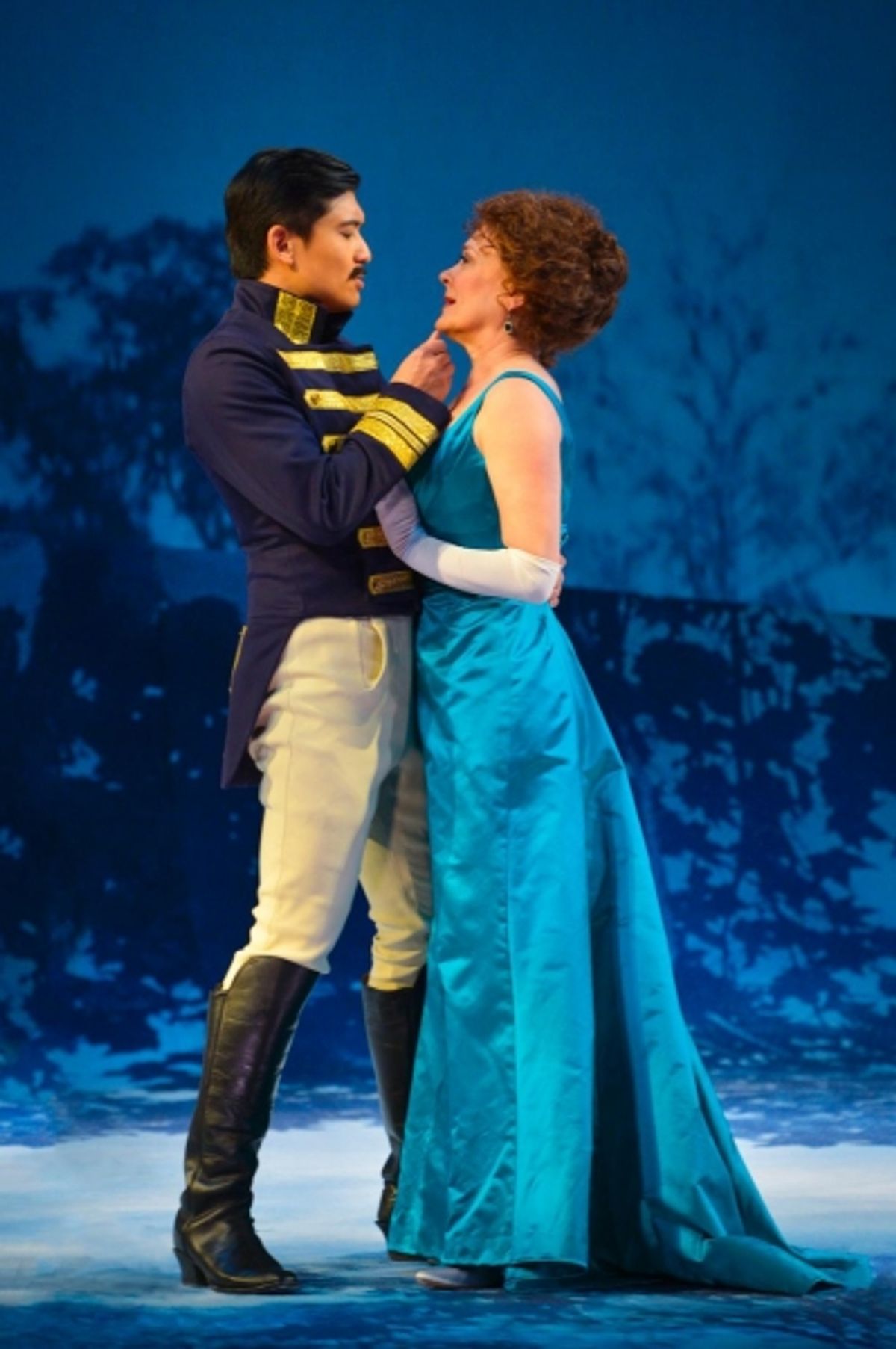 Count Carl-Magnus Malcolm (Paolo Montalban) caresses Desiree Armfeldt (Tony Award winner Karen Ziemba) at 