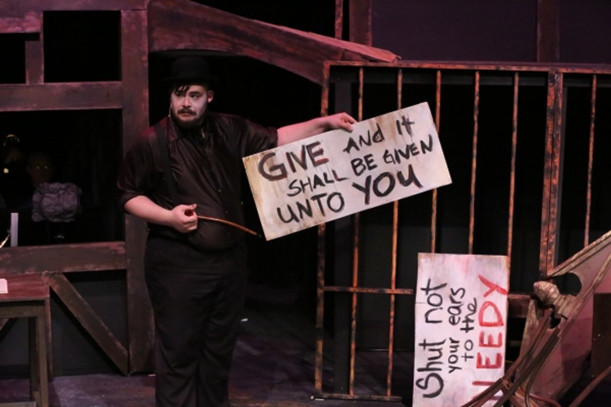 Mr. Peachum (Zachary Allen Farmer) explains his business at 