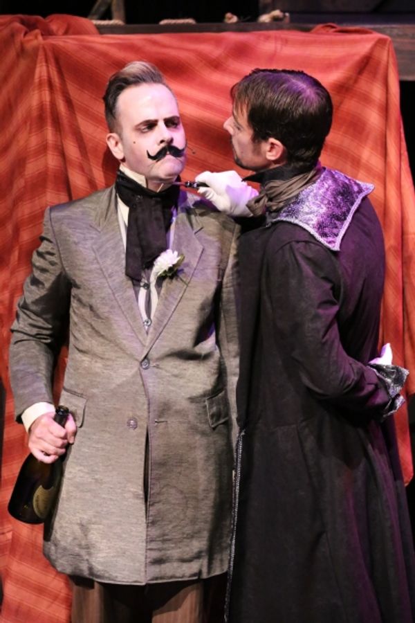 Readymoney Matt (Brian Claussen) is threatened by Macheath (Todd Schaefer) Photo