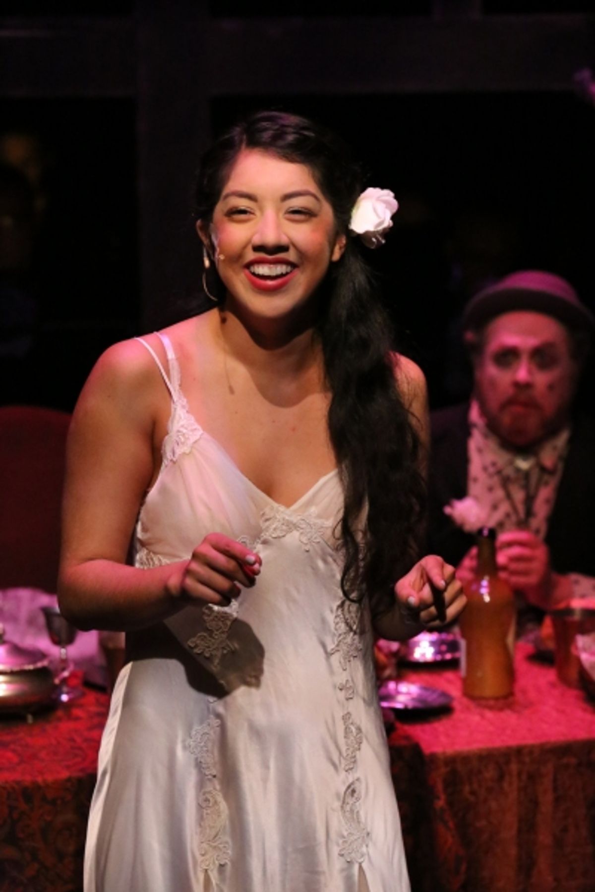 Polly (Cherlynn Alvarez) sings ''Pirate Jenny'' with Crookfinger Jake (Kent Coffel) listening at 