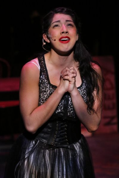 Polly (Cherlynn Alvarez) sings ''Polly''s Song'' Photo