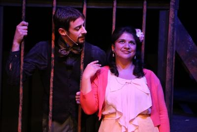 Macheath (Todd Schaefer) is visited in prison by one of his wives, Lucy Brown (Christ Photo