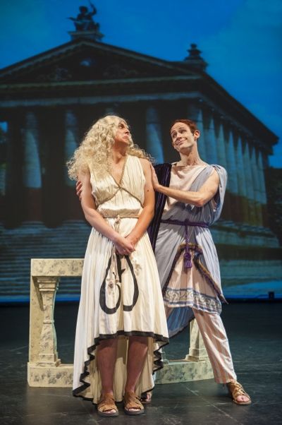 A reluctant Hysterium (Mike Meadors) is persuaded by Psuedolus (Tomas Theriot) to pos Photo