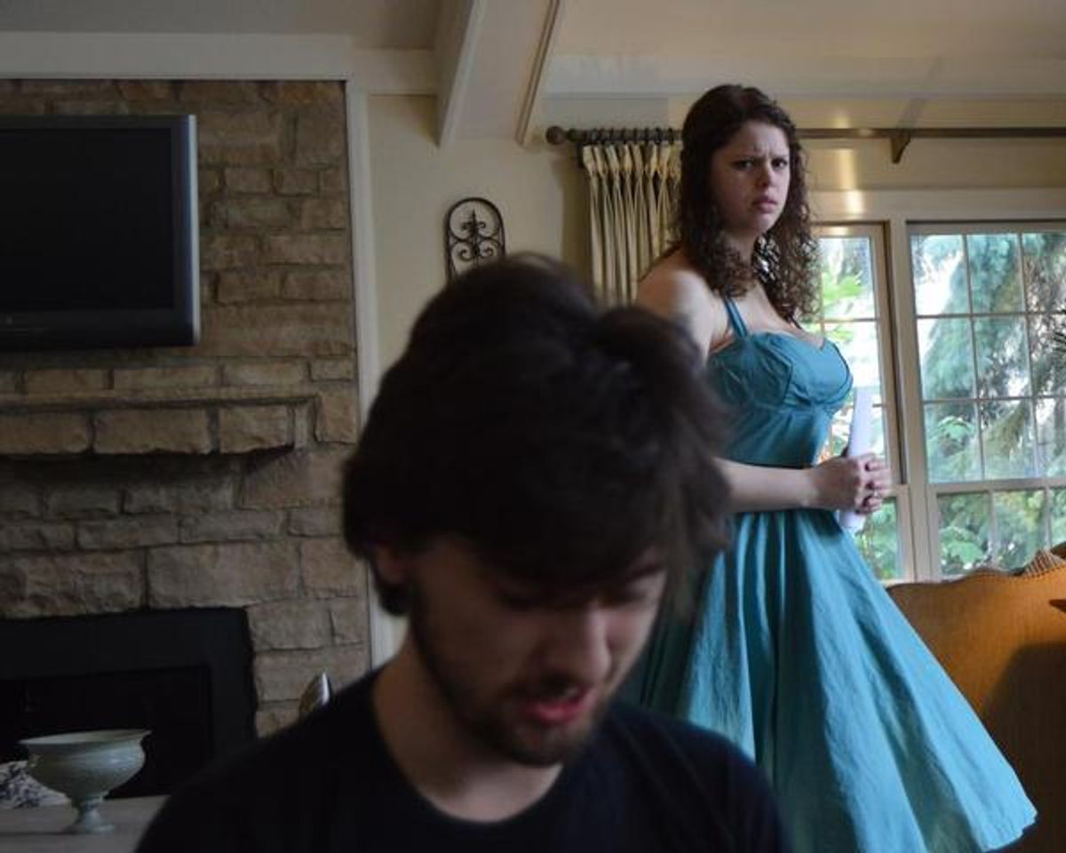 Rachel Marschner (Ophelia) looks on, concerned, as Jack Miller (Hamlet) seems to be pondering suicide in Act III of William Shakespeare''s Hamlet, being presented June 25-27, 2015 at the Abbey Theater of Dublin by CPC Theatrical.  at 