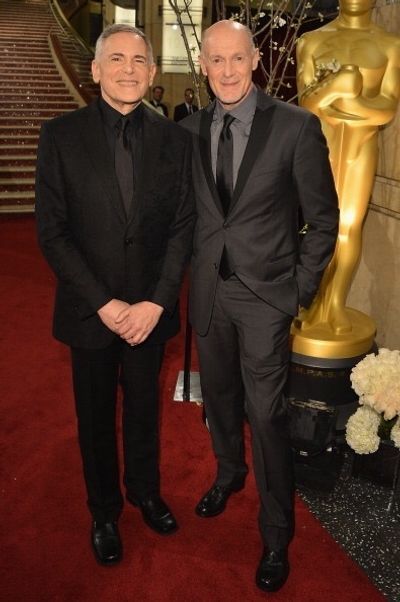 Craig Zadan & Neil Meron walk the red carpet prior to the 85th Oscars telecast. Photo