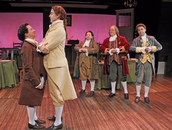 Greg Horton as John Adams, Nicholas Carroll as Thomas Jefferson, Lionel Ruland as Rog Photo