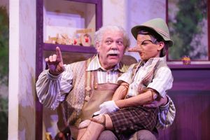 Geppetto (Nicholas F. Saverine) gets to know his new son Pinocchio (Topher Cundith). @ BroadwayWorld Geppetto (Nicholas F. Saverine) gets to know his new son Pinocchio (Topher Cundith). Photo