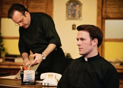 Jakie Cabe (Father Tim Farley) and Justin Lemeiux (Mark Dolson) Photo