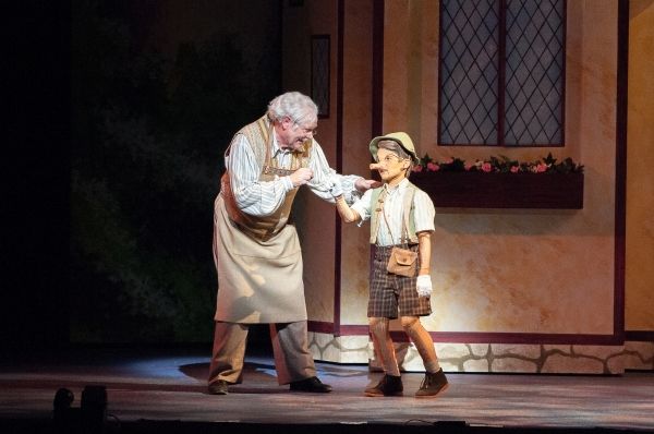 Nicholas F. Saverine as Geppetto and Topher Cundith as Pinocchio Photo