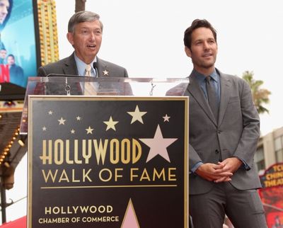 President and CEO of Hollywood Chamber of Commerce, Leron Gubler, honors actor Paul R Photo