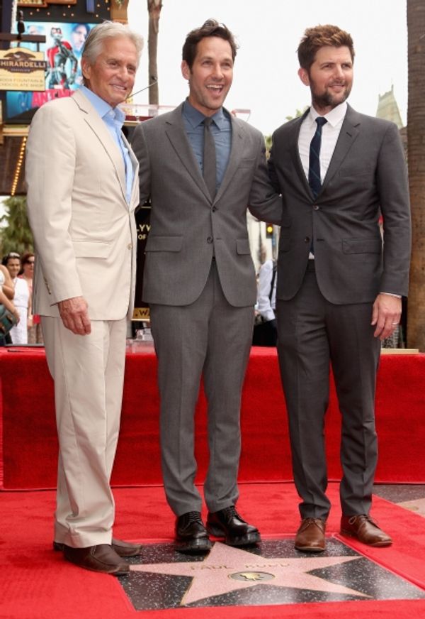 Paul Rudd poses with actors Michael Douglas and Adam Scott Photo