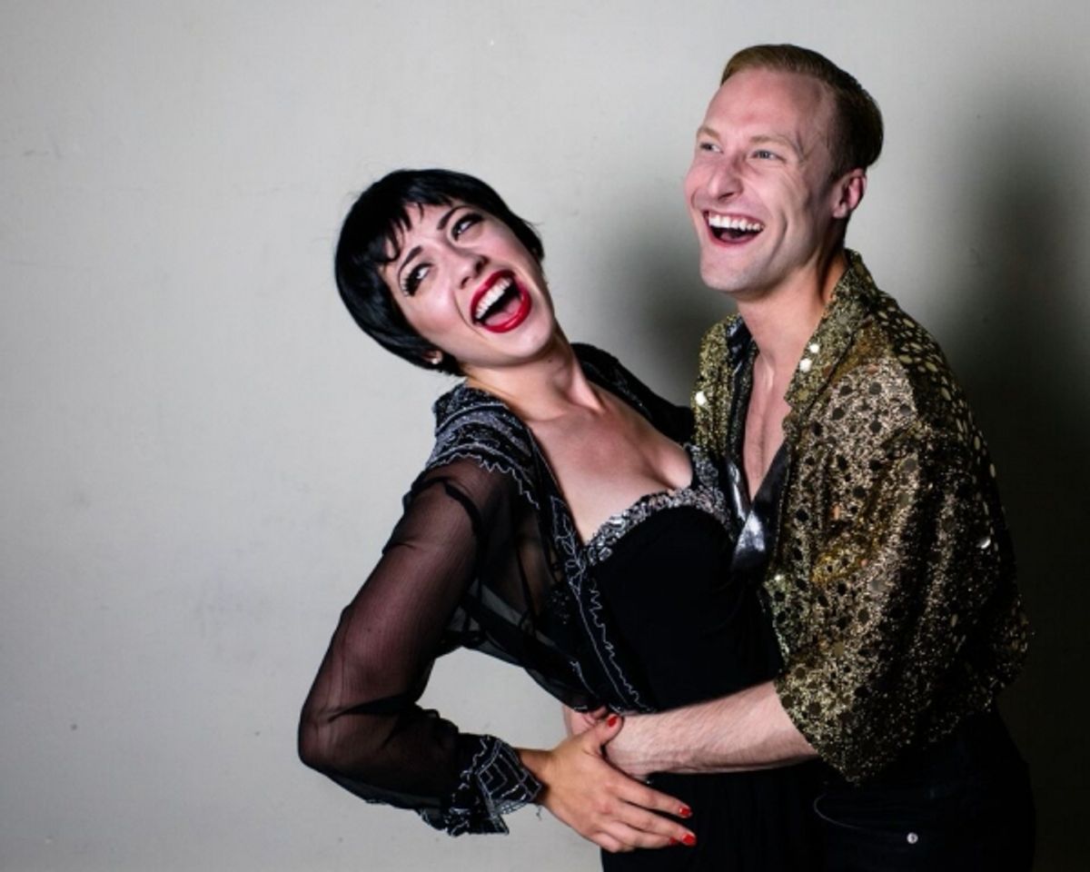 Michelle Lauto as Liza, and Chris Logan as Peter Allen at 