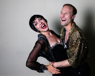 Michelle Lauto as Liza, and Chris Logan as Peter Allen Photo