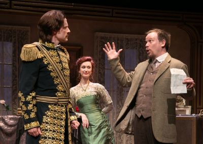 The Debt Collector (Sheffield Chastain) sees through The Actorâ€s (Jon Barker) rus Photo