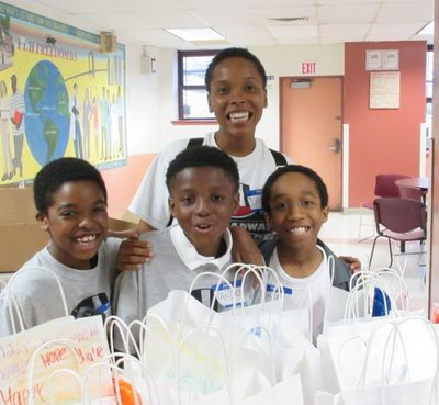 Broadway Serves Toiletry Drive 2015 - KINKY BOOTS boys with Dionne Figgins Photo