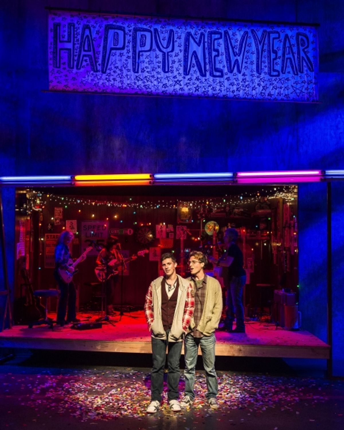 Curt Hansen and Ryder Bach (foreground); Band members Janet Robin, Vivi Rama and Julie Wolf (background) at 