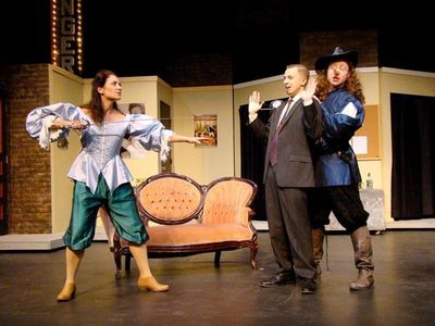 George and Charlotte Hay (Andrew Pond and Lisa Savegnago) are interrupted mid-sword-f Photo