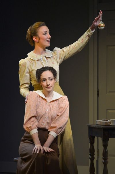 Chaya (Sharon Rietkerk, back) brings home an ornament to cheer up Sarah (Megan McGinn Photo