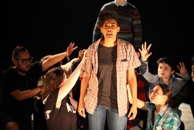 Kyla Norton with the cast of About Face Youth Theatre Ensemble's 15 BREATHS Photo