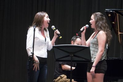 Andrea Burns and camper Carlyn Barenholtz sing 'Home' from BEAUTY AND THE BEA Photo