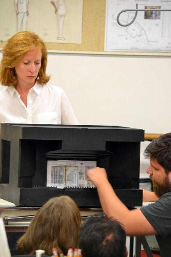 Susan V. Booth and Technical ' Kyle Longwell present the set model Photo