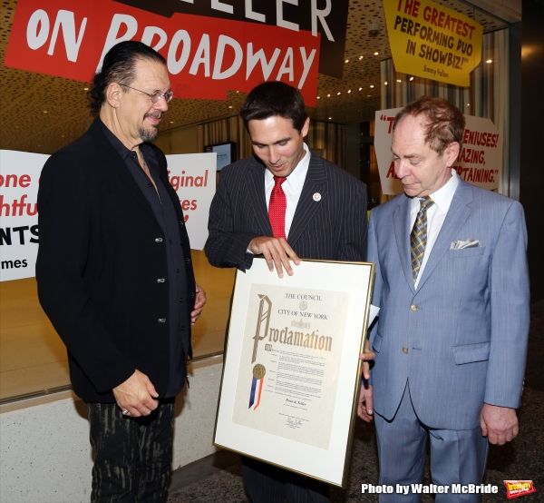 Penn &amp; Teller accept a proclamation from Ken Kallos Photo