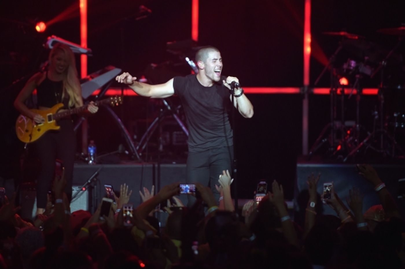 Photo Flash: Nick Jonas and Demi Lovato Take the Stage for MTV's VMA Benefit Concert  Image
