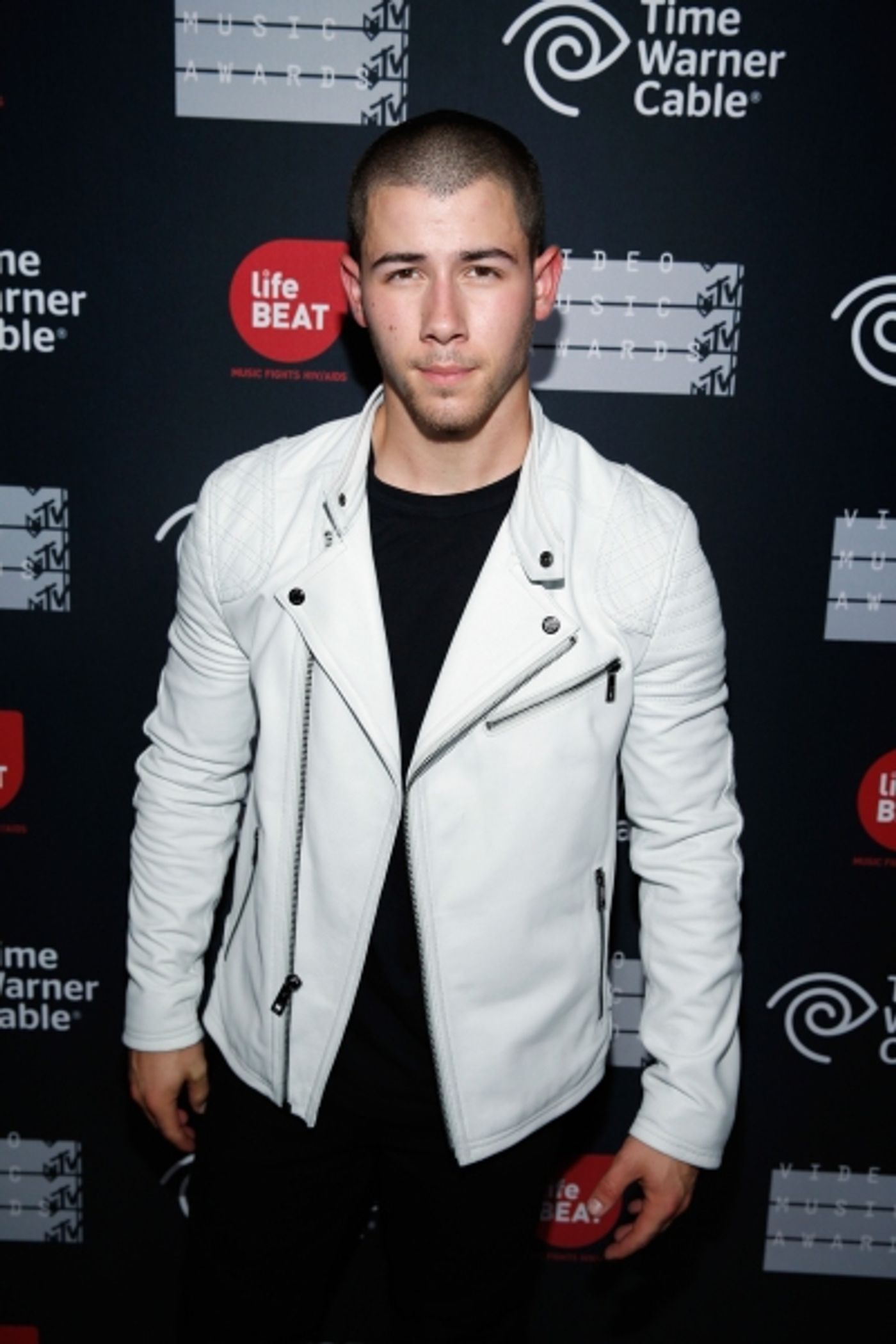 Photo Flash: Nick Jonas and Demi Lovato Take the Stage for MTV's VMA Benefit Concert  Image
