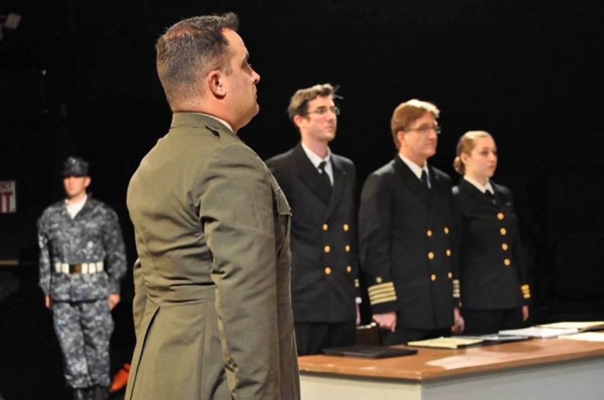 Foreground: TOM PHIEL (Jasper).  Background (L to R):  JACOB TICE (Kaffee), JIM ROGERS (Sam) and CASSIE JO FASTABEND (Jo) from the Lakewood Playhouse Production of ''A FEW GOOD MEN'' at 